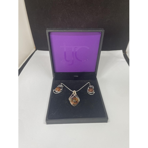 507 - A MARKED SILVER NECKLACE AND EARRING SET WITH AMBER STONES IN A PRESENTATION BOX