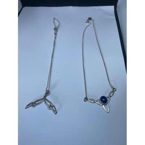 509 - FOUR MARKED SILVER NECKLACES WITH PENDANTS