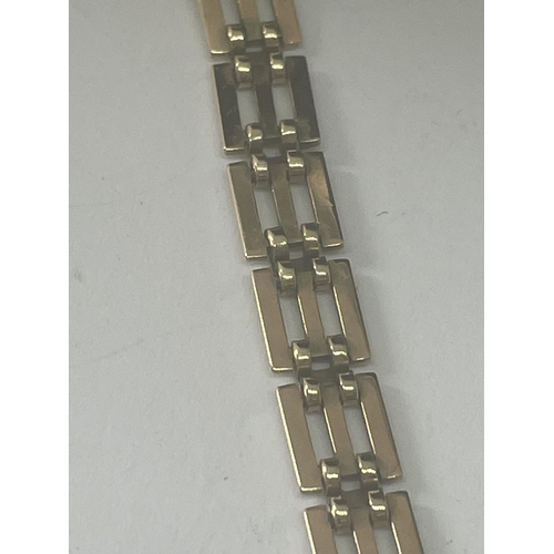 510 - A LADIES 9CT GOLD 17 JEWEL INCABLOC AVIA SWISS MADE WATCH ON A 9CT GOLD GATE BRACELET STRAP