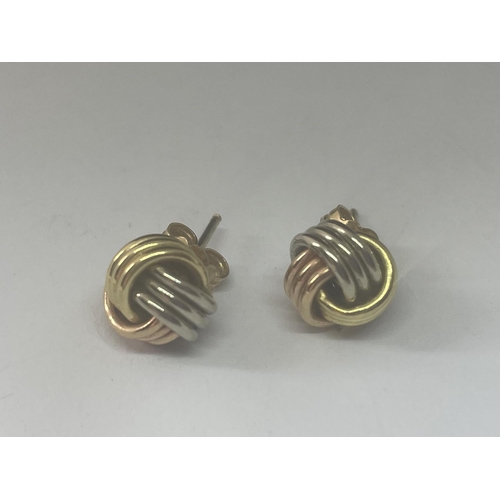 511 - A PAIR OF 18CT WHITE AND YELLOW GOLD KNOT STUD EARRINGS GROSS WEIGHT 2.5G