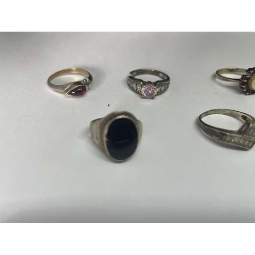 518 - FIVE MARKED SILVER RINGS