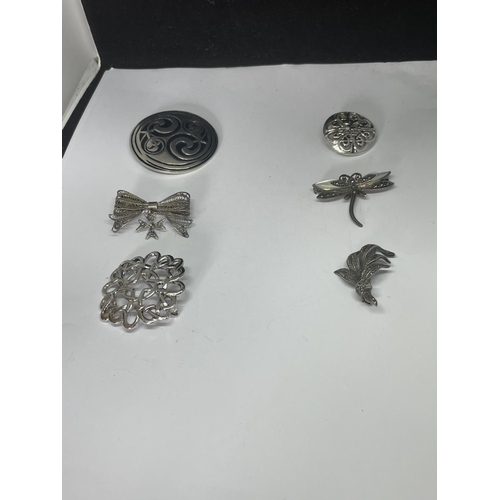 525 - SIX SILVER BROOCHES