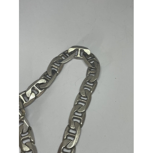 535 - A MARKED SILVER HEAVY CURB LINK BRACELET