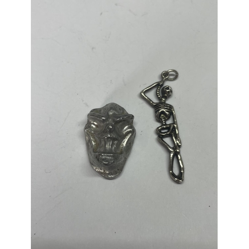 536 - A SILVER SKULL AND SKELETON