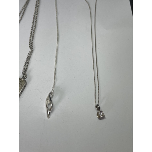 537 - FOUR MARKED SILVER NECKLACES WITH PENDANTS