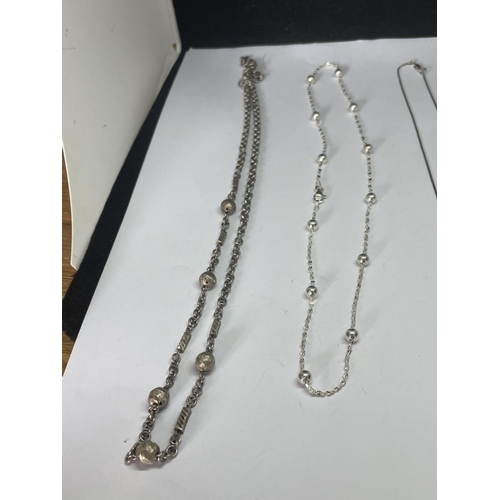 561 - FOUR SILVER NECKLACES WITH BALL DESIGN