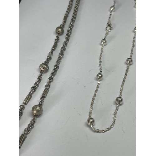 561 - FOUR SILVER NECKLACES WITH BALL DESIGN