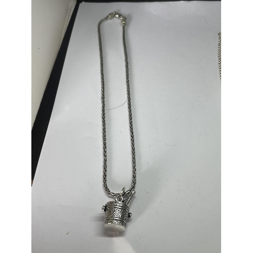 564 - TWO MARKED SILVER NECKLACES ONE WITH A CHAMAGNE BUCKET AND BOTTLE PENDANT