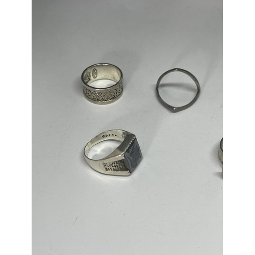 569 - FIVE MARKED SILVER RINGS