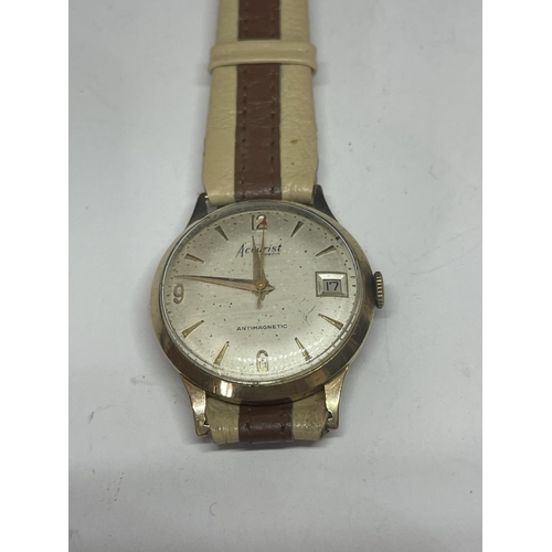 573 - A GENTS ACCURIST 9 CARAT GOLD WRISTWATCH