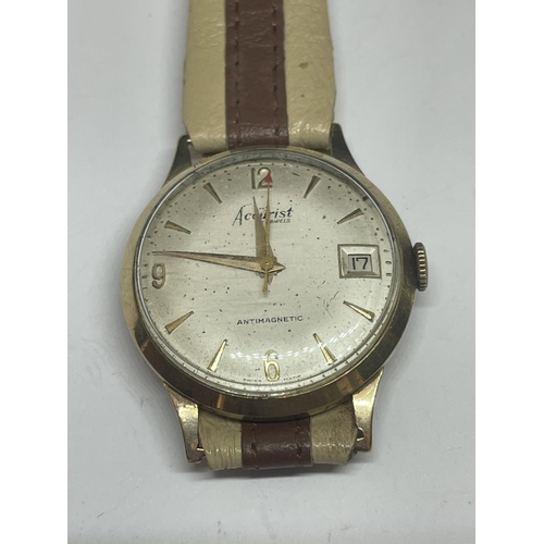 573 - A GENTS ACCURIST 9 CARAT GOLD WRISTWATCH