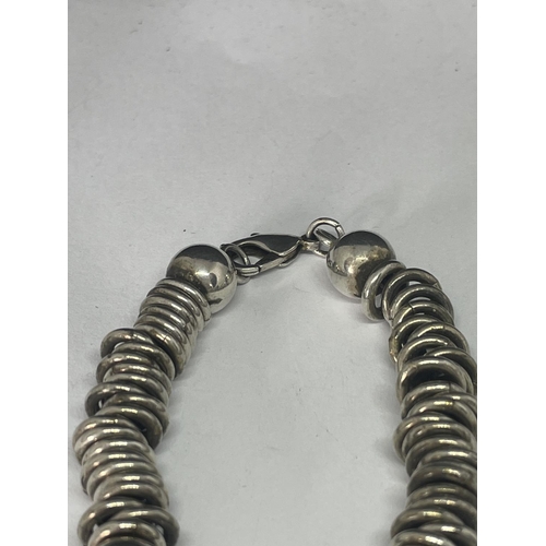 575 - A MARKED SILVER HEAVY BRACELET