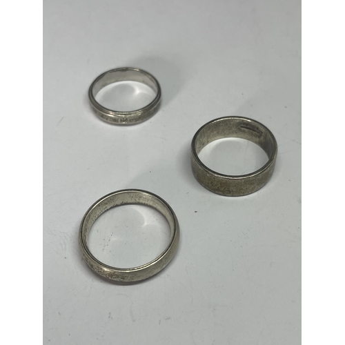 579 - FIVE MARKED SILVER WEDDING BANDS