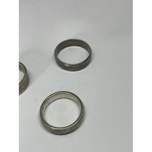 579 - FIVE MARKED SILVER WEDDING BANDS