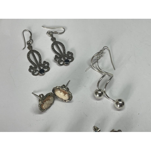 583 - ASSORTED SILVER ITEMS TO INCLUDE THREE PAIRS OF EARRINGS, FOUR PENDANTS AND TWO BELLY BARS