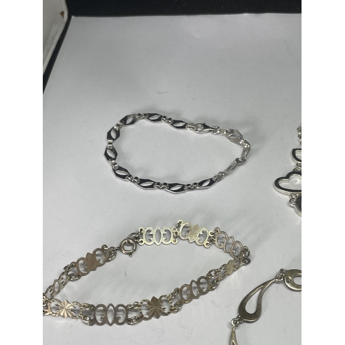 588 - FIVE SILVER BRACELETS