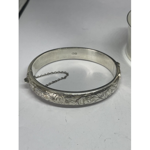 590 - TWO MARKED SILVER BANGLES