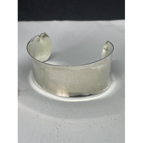 590 - TWO MARKED SILVER BANGLES