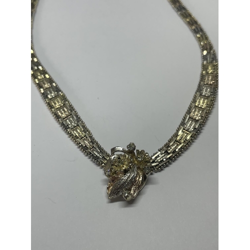 595 - A SILVER GILT NECKLACE AND BRACELET