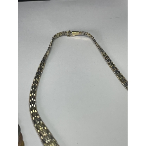 595 - A SILVER GILT NECKLACE AND BRACELET