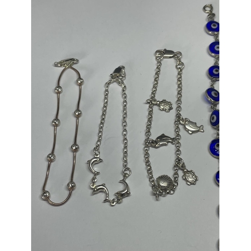 598 - FIVE SILVER BRACELETS TO INCLUDE A BALL, DOLPHIN  AND STONE DESIGNS