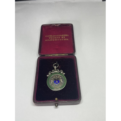 604 - A MARKED SILVER MEDAL IN A PRESENTATION BOX