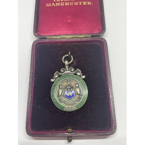 604 - A MARKED SILVER MEDAL IN A PRESENTATION BOX