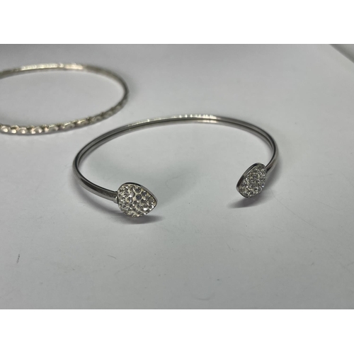 605 - TWO MARKED SILVER BANGLES