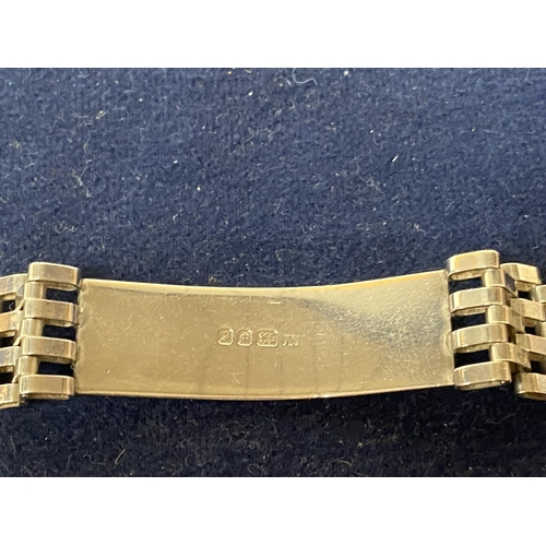 553 - A HALLMARKED SILVER ID BRACELET WITH ON A GATE STRAP