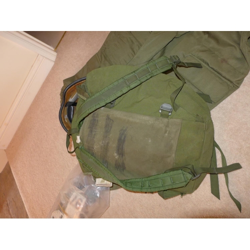 369 - A MILITARY/OUTDOOR ADVENTURE COVERALL, RED HELMET, OVERBOOTS AND STRAPS ETC