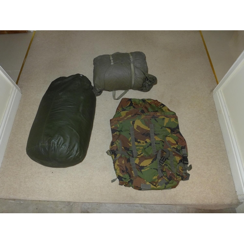 384 - A MILITARY BERGEN BACKPACK AND TWO MILITARY SLEEPING BAGS (3)