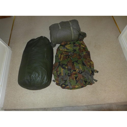 384 - A MILITARY BERGEN BACKPACK AND TWO MILITARY SLEEPING BAGS (3)