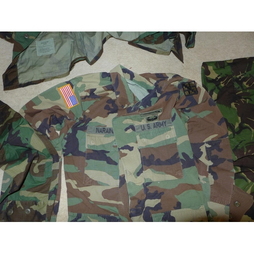 391 - A LARGE COLLECTION OF MILITARY/SHOOTING/FISHING CAMOUFLAGE UNIFORMS TO INCLUDE U.S. ARMY WITH DELTA ... 