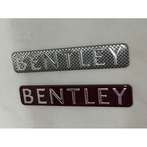 102 - TWO BENTLEY CAR PANEL BADGES 17CM X 3.5CM