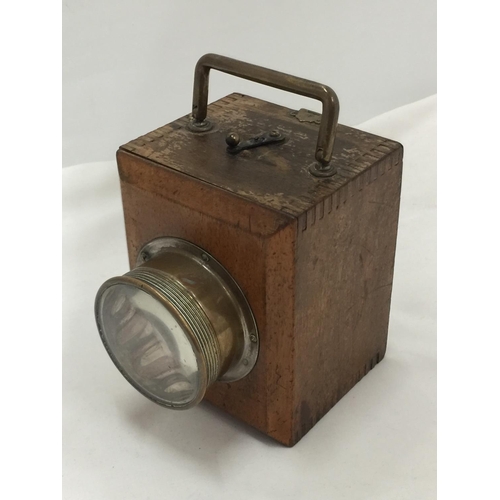 103 - A WOODEN MINING INSPECTION LAMP WITH BRASS FITTING - WORKING AT TIME OF CATALOGUING