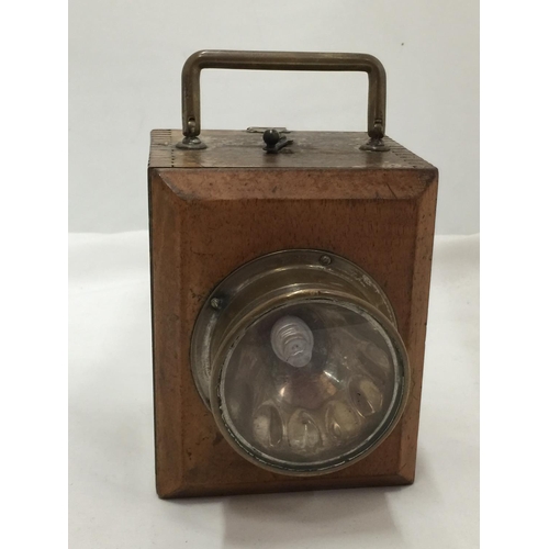 103 - A WOODEN MINING INSPECTION LAMP WITH BRASS FITTING - WORKING AT TIME OF CATALOGUING