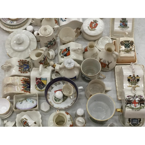 108 - A LARGE QUANTITY OF CRESTED WARE TO INCLUDE MINIATURE CHEESE DISHES, PLATES, VASES, CUPS, JUGS, ETC