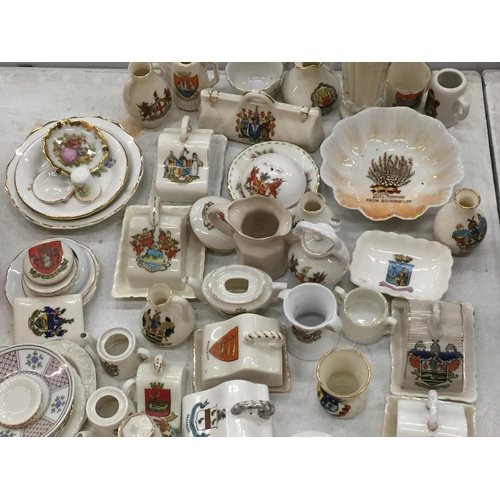 108 - A LARGE QUANTITY OF CRESTED WARE TO INCLUDE MINIATURE CHEESE DISHES, PLATES, VASES, CUPS, JUGS, ETC