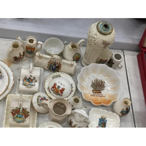 108 - A LARGE QUANTITY OF CRESTED WARE TO INCLUDE MINIATURE CHEESE DISHES, PLATES, VASES, CUPS, JUGS, ETC