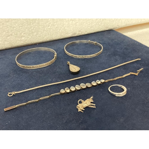 638 - SEVEN ITEMS OF SILVER TO INCLUDE TWO SILVER ID BRACELETS, A SILVER RING, TWO SILVER PENDANTS AND TWO... 