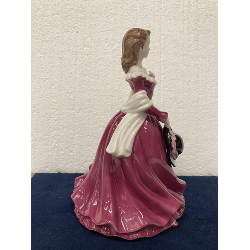 710 - A FINE BONE CHINA  LADY FIGURINE FROM THE LEONARDO COLLECTION - HEIGHT 20CM