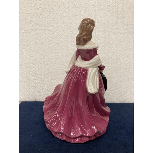 710 - A FINE BONE CHINA  LADY FIGURINE FROM THE LEONARDO COLLECTION - HEIGHT 20CM