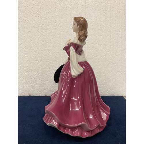 710 - A FINE BONE CHINA  LADY FIGURINE FROM THE LEONARDO COLLECTION - HEIGHT 20CM