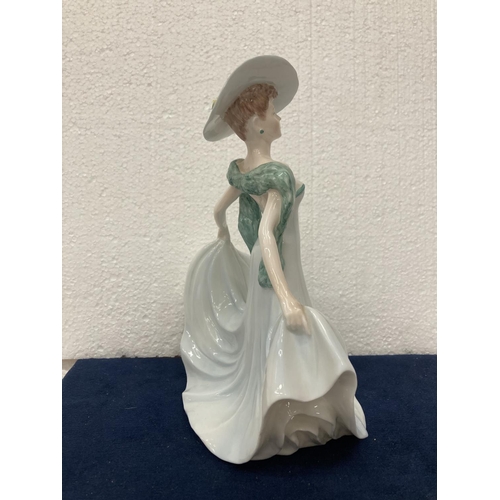 712 - A COALPORT LADIES OF FASHION FIGURINE MODELLED BY JOHN BROMLEY AND DECORATED BY HAND - 22 CM