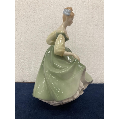 714 - A ROYAL DOULTON FIGURE 'FAIR LADY' HEIGHT 20CM - A/F SMALL CHIP TO SKIRT OF DRESS