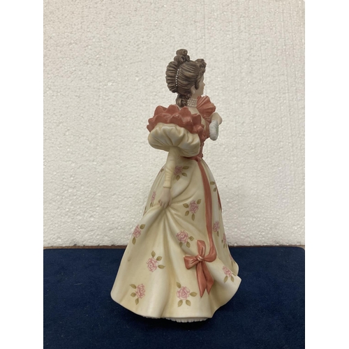 716 - A BROOKS & BENTLEY PORCELAIN FIGURINE 