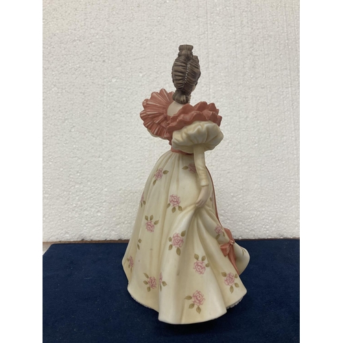 716 - A BROOKS & BENTLEY PORCELAIN FIGURINE 