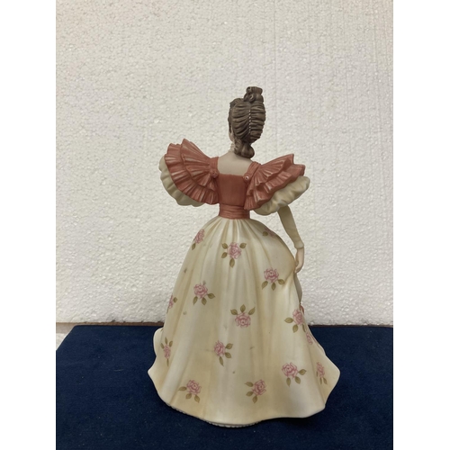 716 - A BROOKS & BENTLEY PORCELAIN FIGURINE 