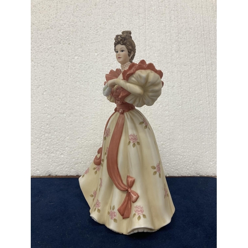 716 - A BROOKS & BENTLEY PORCELAIN FIGURINE 