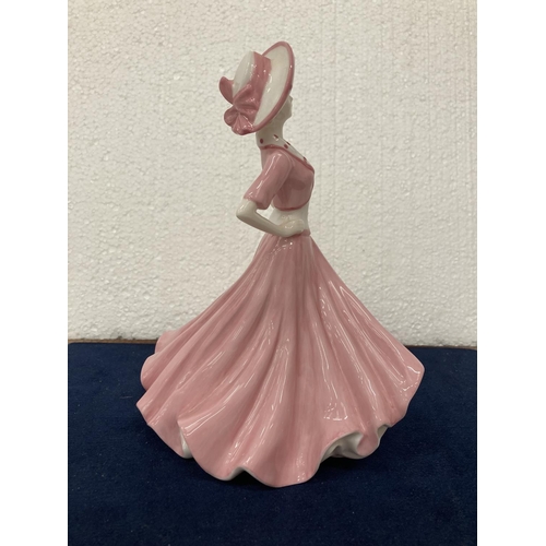 719 - A BONE CHINA COALPORT LADY FIGURINE HAND DECORATED AND MODELLED BY JACK GLYNN 